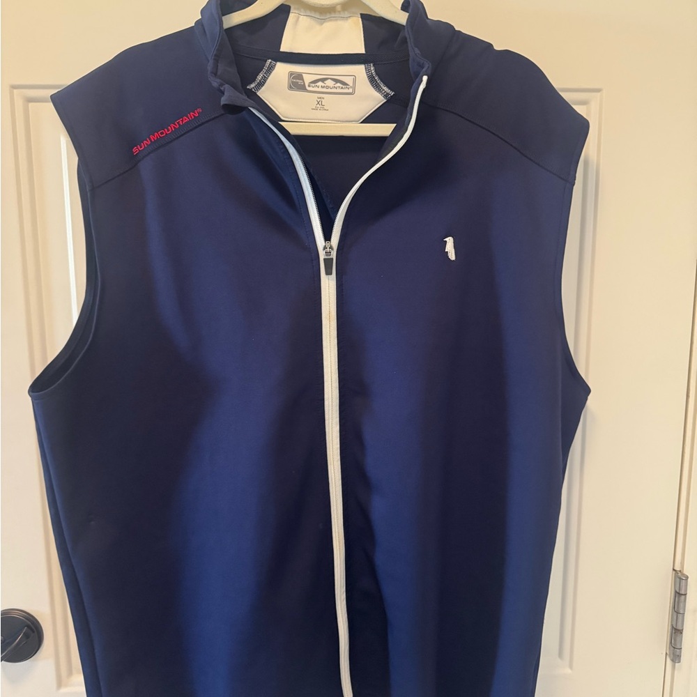 Blue Mountain Men's Navy Vest branded with Crow Valley Golf Club logo